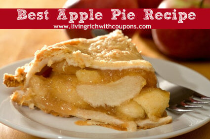 Freshly baked deep dish apple pie served on white plate.