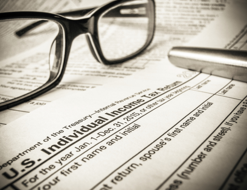 Detail Of A 2015 Tax Return Form With Glasses And Pen