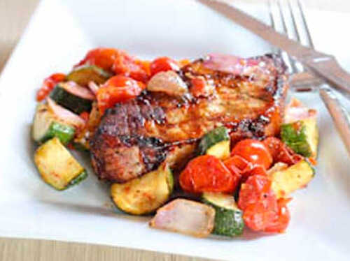 Grilled Pork Chops with Tomato and Zucchini